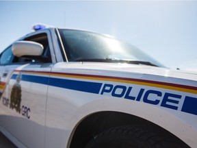 The driver of a stolen truck was arrested thanks to the help of a Calgary police dog, but a passenger managed to flee the scene on foot and evaded police.