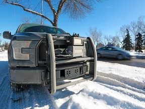 A Calgary Police Service photo radar truck monitors traffic heading west on Memorial Drive N.W. near 14th Street on Thursday, February 21, 2019. The province announced it will require police forces to prove that photo radar is improving safety and not simply being used as a revenue generator.
