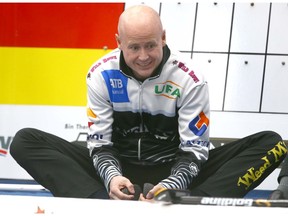 Kevin Koe stretches during warm up at the Pinty's Grand Slam of Curling Humpty's Champions Cup event at WInSport in Calgary on Tuesday, April 24, 2018. Jim Wells/Postmedia