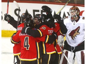 Calgary Flames blueliner Mark Giordano scores on Arizona Coyotes goalie, Calvin Pickard in second period action at the Scotiabank Saddledome in Calgary on Monday February 18, 2019. Darren Makowichuk/Postmedia