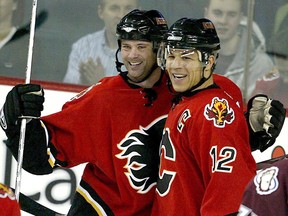 Jarome Iginla and Craig Conroy celebrate another goal at the Saddledome on Feb. 15, 2007.