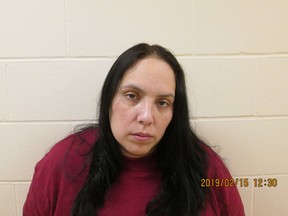 Cori Katherine Taylor, 39, of Airdrie was charged by Airdrie RCMP with three counts of fraud over $5,000, four counts of forgery and identify theft, among others. She was also charged in 2017 after she allegedly stole funds from a Crossfield children's charity. (submitted/RCMP)