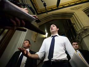 Prime Minister Justin Trudeau arrives to a caucus meeting on Parliament Hill in Ottawa on Wednesday, Feb. 20, 2019.