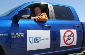 United Conservative Leader Jason Kenney drives his truck after meeting with reporters at the Blackfoot Diner and Truck Stop, in Calgary, on Friday, July 13, 2018.