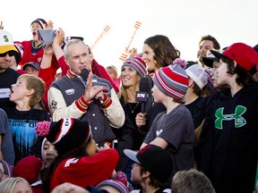 Canadian icon Ron MacLean and three-time Olympic gold medalist Jennifer Botterill onsite in Selkirk, MB., at the Rogers Hometown Hockey Tour on Sun., Oct. 19, 2014. (Brook Jones/Postmedia Archive)