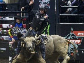 Jared Parsonage rides bull Good Bye Earl during the PBR tour stop in Saskatoon back in November. File photo by Liam Richards/Postmedia.