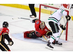 Dallas Stars Alexander Radulov scores on David Rittich of the Calgary Flames during NHL hockey at the Scotiabank Saddledome in Calgary on Wednesday, March 27, 2019. Al Charest / Postmedia