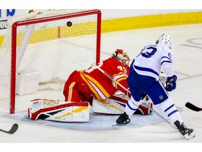 Toronto Maple Leafs Tyler Ennis scores on David Rittich of the Calgary Flames during NHL hockey at the Scotiabank Saddledome in Calgary on Monday, March 4, 2019. Al Charest / Postmedia