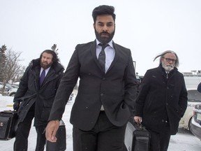 Jaskirat Singh Sidhu, the driver of the truck that collided with the bus carrying the Humboldt Broncos hockey team arrives with his lawyers Mark Brayford, left, and Glen Luther, right, for closing arguments at his sentencing hearing Thursday, January 31, 2019 in Melfort, Sask. Kevin Matechuk says he will never, never forgive the semi driver who caused the deadly Humboldt Broncos bus crash.