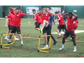 Cavarly FC players prepare for parctice during drills in Calgary during day one of the Canadian Premier League team's inaugural training camp on Monday, March 4, 2019. Jim Wells/Postmedia
