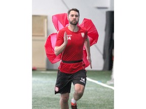 Cavarly FC defender Jay Wheeldon trains with a chute during day two of the Canadian Premier League team's inaugural training camp in Calgary on Wednesday, March 6, 2019. Jim Wells/Postmedia