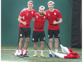 Cavarly FC (L-R) Dominick Zator, Sergio Camargo and Joel Waterman joke for the camera during a breif break during day two of the Canadian Premier League team's inaugural training camp in Calgary on Wednesday, March 6, 2019. Jim Wells/Postmedia