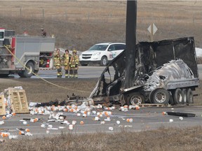 Calgary Police investigate at the scene of a  serious collision involving a semi truck on northbound Stoney Tr south of Country Hills Blvd in Calgary on Saturday, March 23, 2019. North and southbound Stoney Tr were shutdown for a number of hours during the investigation and to clean up the debris. Jim Wells/Postmedia