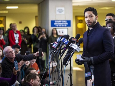 Actor Jussie Smollett speaks to reporters at the Leighton Criminal Courthouse in Chicago after prosecutors dropped all charges against him, Tuesday, March 26, 2019.