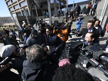 Actor Jussie Smollett, center, leaves the Leighton Criminal Courthouse in Chicago on Tuesday, March 26, 2019, after prosecutors dropped all charges against him. Smollett had been indicted on 16 felony counts related to making a false report that he was attacked by two men who shouted racial and homophobic slurs.