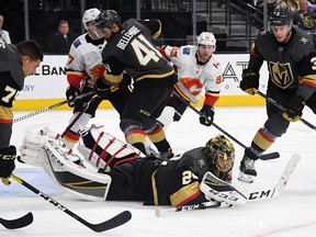 Marc-Andre Fleury of the Vegas Golden Knights dives on the puck in the third period of a game against the Calgary Flames at T-Mobile Arena on March 6, 2019 in Las Vegas.