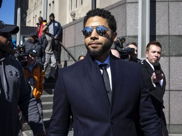 Actor Jussie Smollett leaves the Leighton Criminal Courthouse in Chicago on Tuesday March 26, 2019, after prosecutors dropped all charges against him. Smollett was indicted on 16 felony counts related to making a false report that he was attacked by two men who shouted racial and homophobic slurs.