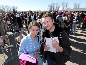 L-R, Britta Den Hoed and Benjamin MacKay were among thousands who came out during the 21st Annual Youth Hiring Fair at the Big Four building in Calgary on Wednesday, March 20, 2019. Darren Makowichuk/Postmedia