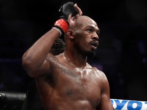 Jon Jones celebrates after defeating Anthony Smith following their light heavyweight title bout during UFC 235 at T-Mobile Arena on March 2, 2019 in Las Vegas.