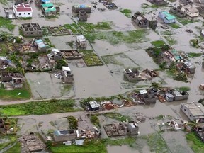 This image made available by International Federation of Red Cross and Red Crescent Societies (IFRC) on Monday March 18, 2019, shows an aerial view from a helicopter of flooding in Beira, Mozambique.