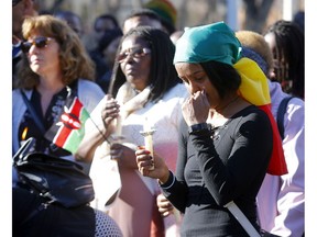 Hundreds came out to support family during Sunday's vigil for Calgarian Derick Lwugi and all those killed in last weekend's Ethiopian Airlines crash. Photo by Darren Makowichuk/Postmedia.