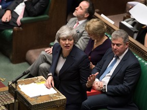 Britain's Prime Minister Theresa May speaks to lawmakers in the House of Commons, London, Wednesday March 13, 2019.