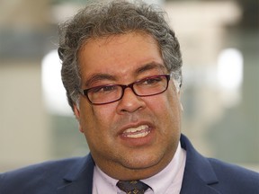 Mayor Naheed Nenshi speaks to reporters following a White Hat ceremony at YYC. Sunday, March 24, 2019. Brendan Miller/Postmedia