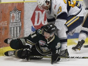 A file photo of Okotoks Oilers' Quinn Olson being checked to the ice. Olson is at the centre of a controversy during a playoff game between the Oilers and the Calgary Canucks.