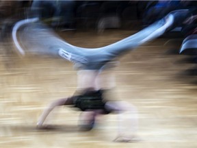 In this file picture taken with a long time exposure on March 12, 2017, Jannis Bednarzik performs during the German Breakdance Championships in Magdeburg, Germany. Getting hip to breakdancing's appeal with young audiences, organizers of the 2024 Paris Olympics want the dance sport that spread from New York in the 1970s to become a medal event at the games.