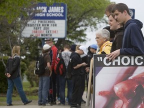 Anti-abortion demonstrators protest outside Jack James Public High School in Calgary in 2011.