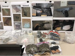 Thousands of grams of drugs seized in a joint operation by law enforcement agencies in central Alberta sit on display in Red Deer, Alta., on Thursday, March 7, 2019. Three people have been charged with a combined 50 offences in connection to the months-long investigation.