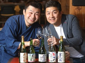 L-R, Yasuhiro Washiyama and Toshiki Uehara of Sake Gami Premium Sake Importer are bringing in new Saki's into Calgary on Saturday, March 16, 2019. Photo taken at Two Penny restaurant in Calgary. Darren Makowichuk/Postmedia