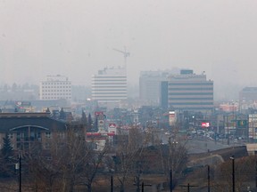 Smoky skies over Calgary looking northbound on Macleod Trail. Saturday, March 23, 2019.