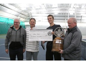 Riaan Dutoit, second from the right, poses with Alberta Grassroots Charity Tennis Championship tournament director Ralph McNiven, right, in Calgary on Sunday, April 28th, 2019. He took home the singles championship defeating Carl Ho.