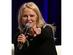 Pamela Anderson takes part in a Q&A session at the Calgary Expo on Sunday. Photo by Gavin Young/Postmedia.