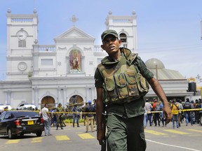 Sri Lankan Army soldiers secure the area around St. Anthony's Shrine after a blast in Colombo, Sri Lanka, on Sunday, April 21, 2019.