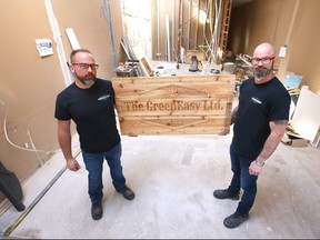 Bill Evans (L) and Wes Breault stand in the work in progress retail store in Strathmore, east of Calgary on Wednesday, April 24, 2019. Breault and his partner pay $3,000 a month to lease their pot retail outlet, although they have not yet been approved to sell due to the supply shortage. Jim Wells/Postmedia
