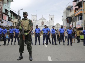 Sri Lankan Army soldiers secure the area around St. Anthony's Shrine after a blast in Colombo, Sri Lanka, Sunday, April 21, 2019. Witnesses are reporting two explosions have hit two churches in Sri Lanka on Easter Sunday, causing casualties among worshippers.