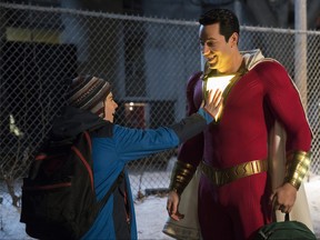 Jack Dylan Grazer as Freddy Freeman and Zachary Levi as the title character in "Shazam!" (Steve Wilkie, Warner Bros. Pictures/DC Comics)