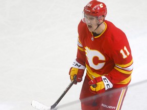 The Calgary Flames' Mikael Backlund scores a goal on Colorado Avalanche goalie Philipp Grubauer in third period action of Game 1 of the NHL playoffs at the Scotiabank Saddledome in Calgary on Thursday, April 11, 2019. Darren Makowichuk/Postmedia