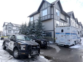 Calgary police investigate the scene at the residence of Jasmine Lovett in Cranston on Sunday, April 28, 2019.