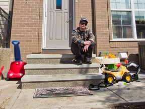 Robert Leeming sits outside his Cranston townhouse on Monday, April 29, 2019 after police had spent several days investigating the residence. Leeming is the primary suspect in the disappearance of Jasmine Lovett and her 22-month-old daughter Aliyah Sanderson.