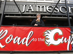 Charles Smith enjoys a beer on the patio at Jamesons Irish Pub along the Red Mile in Calgary on Thursday, April 4, 2019. Darren Makowichuk/Postmedia