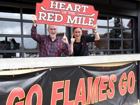 Friends L-R, Christian Keon and Ervin Adem are excited about their home team the Calgary Flames and the Red Mile starting up at Trolley 5 Restaurant and Brewery in Calgary on Monday, April 1, 2019. Darren Makowichuk/Postmedia
