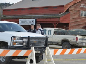 RCMP officers at the scene of a shooting at the Salmon Arm Church of Christ in Salmon Arm, B.C. on Sunday, April 14, 2019.