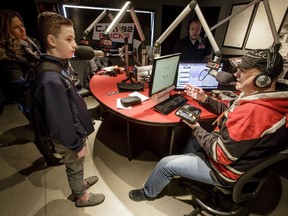 Josh Davies, 12, a Type 1 diabetic whose insulin pump was recently stolen, speaks with CJAY 92 morning show host Gerry Forbes inside the station's studio in Calgary, Alta., on Thursday, March 9, 2017. The Gerry Forbes Secret Wish fund pulled together enough money from listeners to help Davies replace his OmniPod tubeless insulin pump that was recently stolen from a hockey dressing room in Airdrie. Lyle Aspinall/Postmedia Network