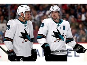 DENVER, COLORADO - APRIL 30: Timo Meier #28 and Logan Couture #39 of the San Jose Sharks confer before a faceoff against the Colorado Avalanche in the second period during Game Three of the Western Conference Second Round during the 2019 NHL Stanley Cup Playoffs at the Pepsi Center on April 30, 2019 in Denver, Colorado.