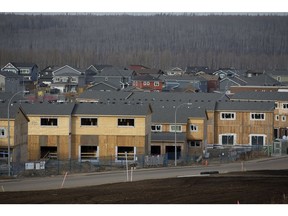 The Hillview Park condominium complex (foreground), in Fort McMurray was destroyed in the 2016 wildfire and the rebuild has stalled. Photo by David Bloom/Postmedia.