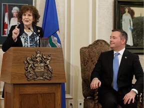 UCP Leader Jason Kenney (right) is seen with Lt.-Gov. Lois Mitchell before being sworn in as Alberta's 18th Premier at Government House during a ceremony in Edmonton, on Tuesday, April 30, 2019.
