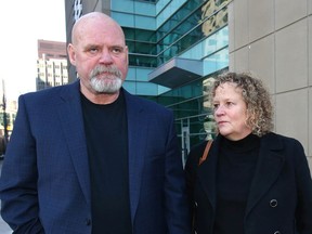 Steve and Heather Walton leave the Calgary Courts Centre in Calgary on Friday, October 19, 2018. Guilty verdicts were filed for six of the seven charges laid against Steve Walton, Heather Walton and Ken Carter.